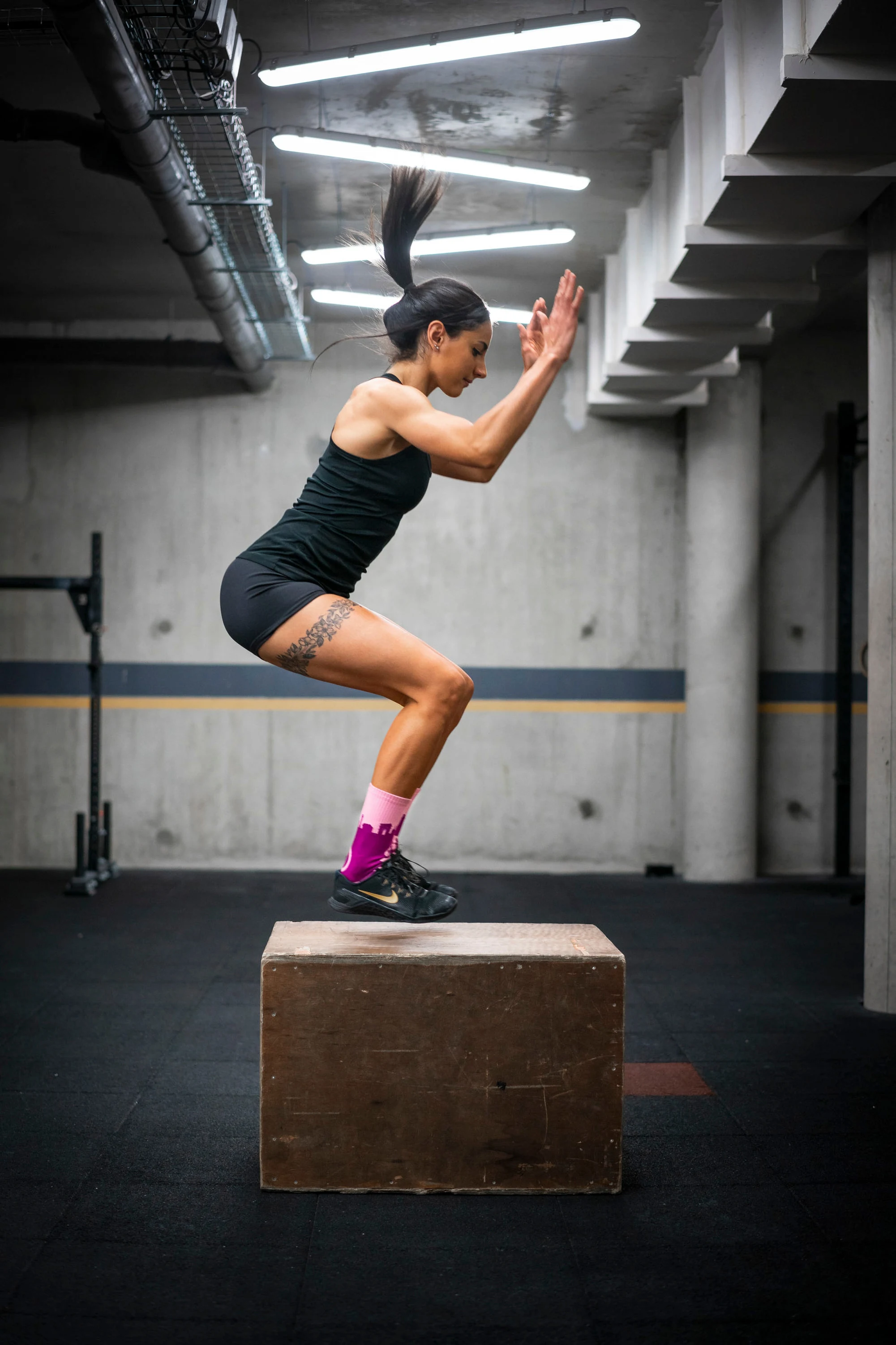 Une réception de saut sur box, en salle